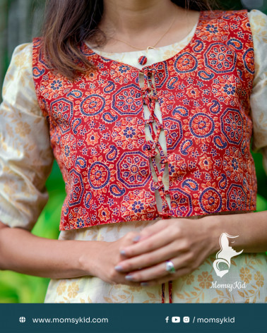 Golden Kasavu Floral Kurthi with Ajarak overcoat