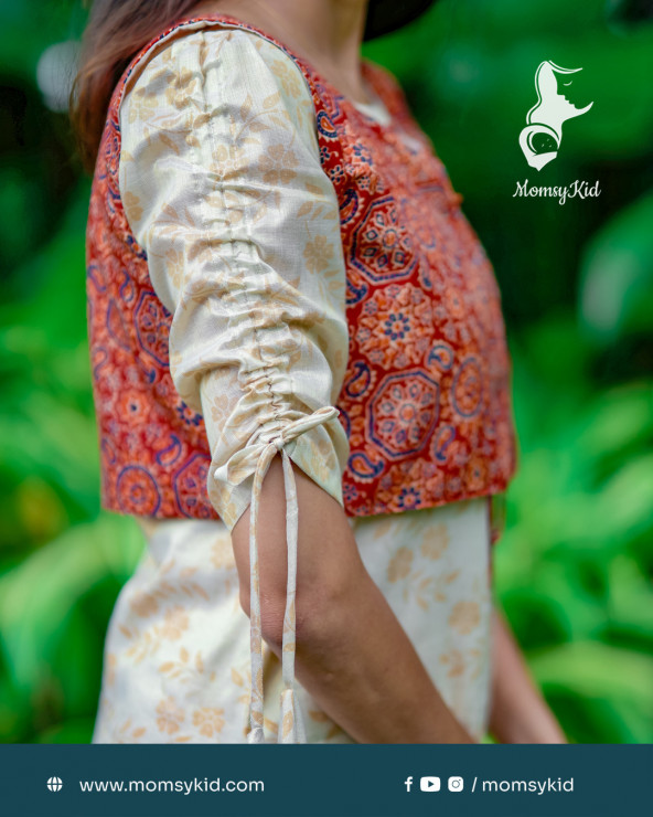 Golden Kasavu Floral Kurthi with Ajarak overcoat