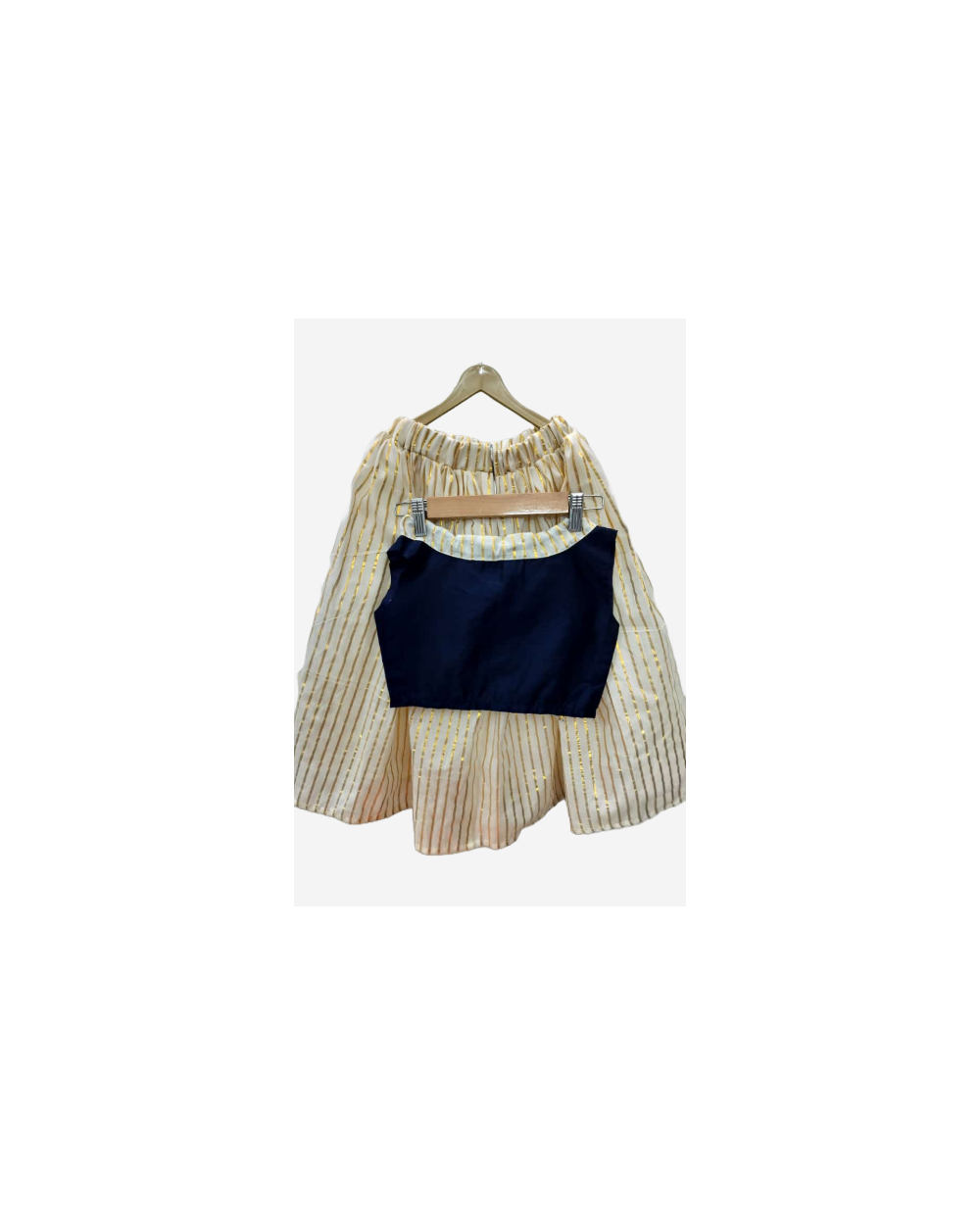 Navy blue jute top paired with striped tissue skirt