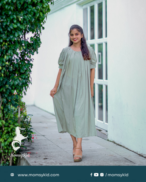 Pastel olive green pleated dress