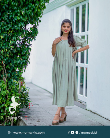 Pastel olive green pleated dress