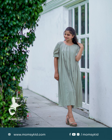 Pastel olive green pleated dress