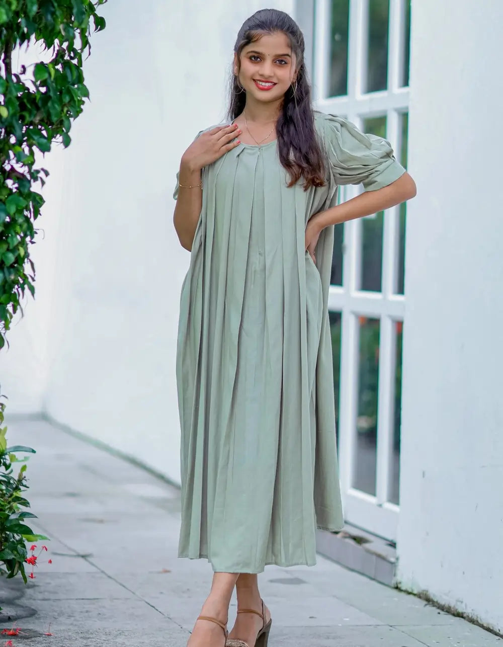 Pastel olive green pleated dress
