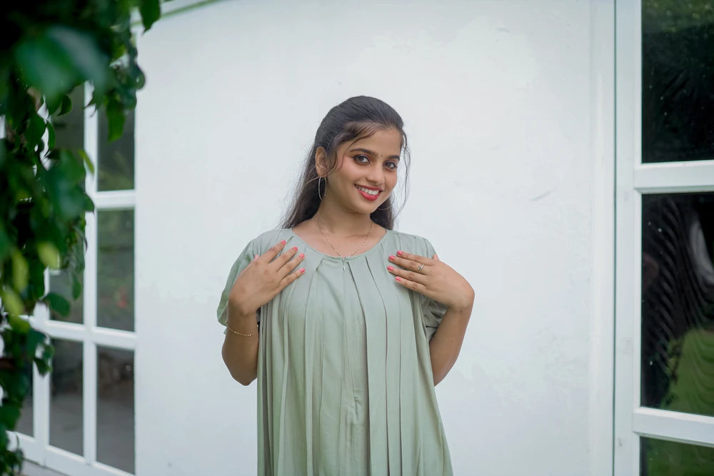 Pastel olive green pleated dress