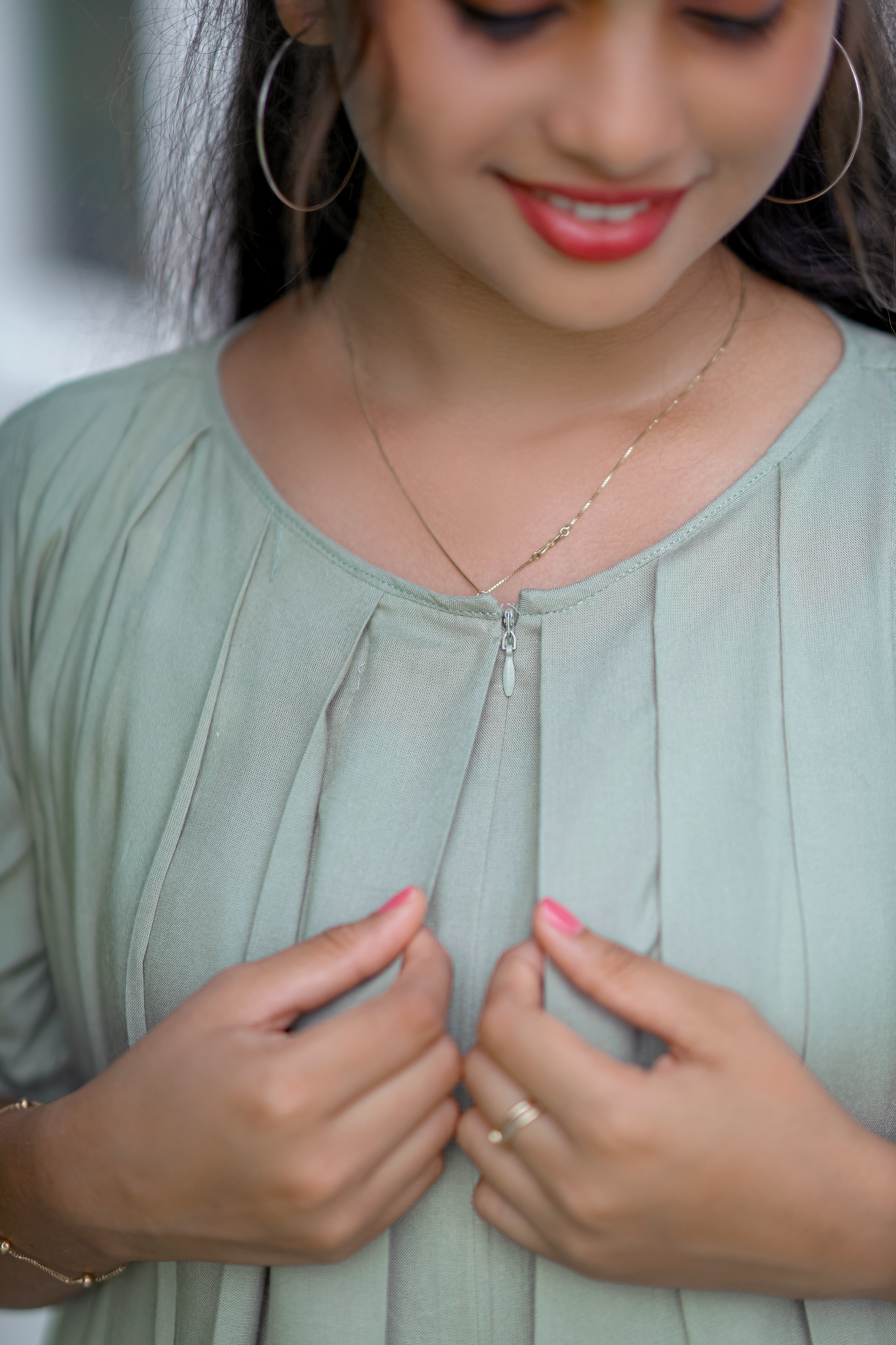 Pastel olive green pleated dress