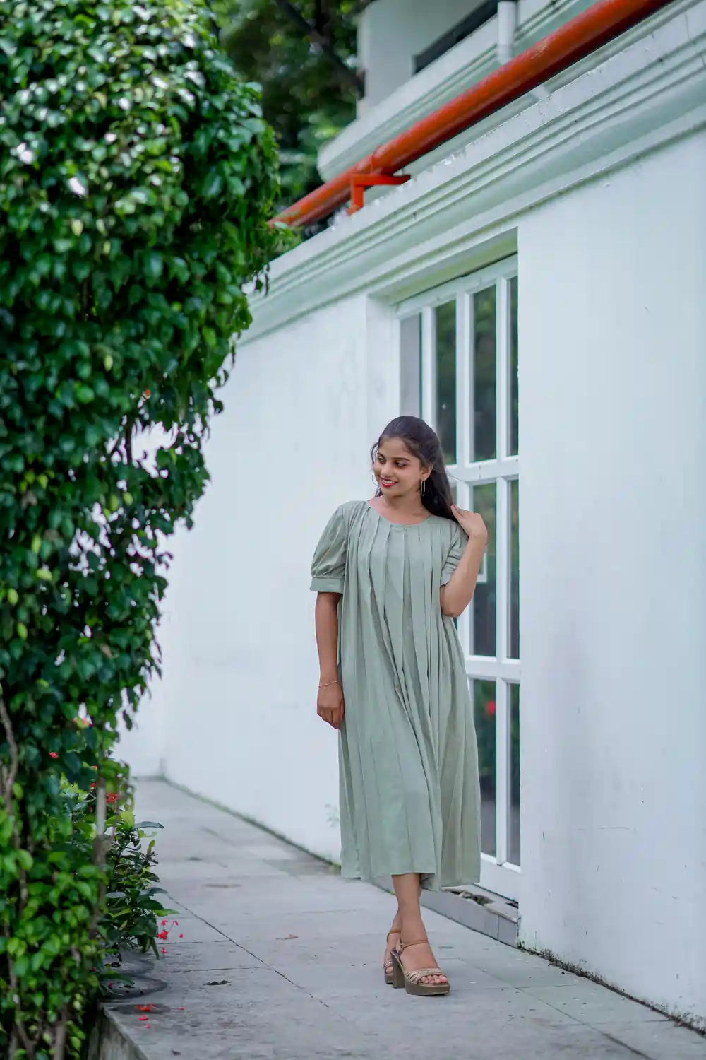 Pastel olive green pleated dress