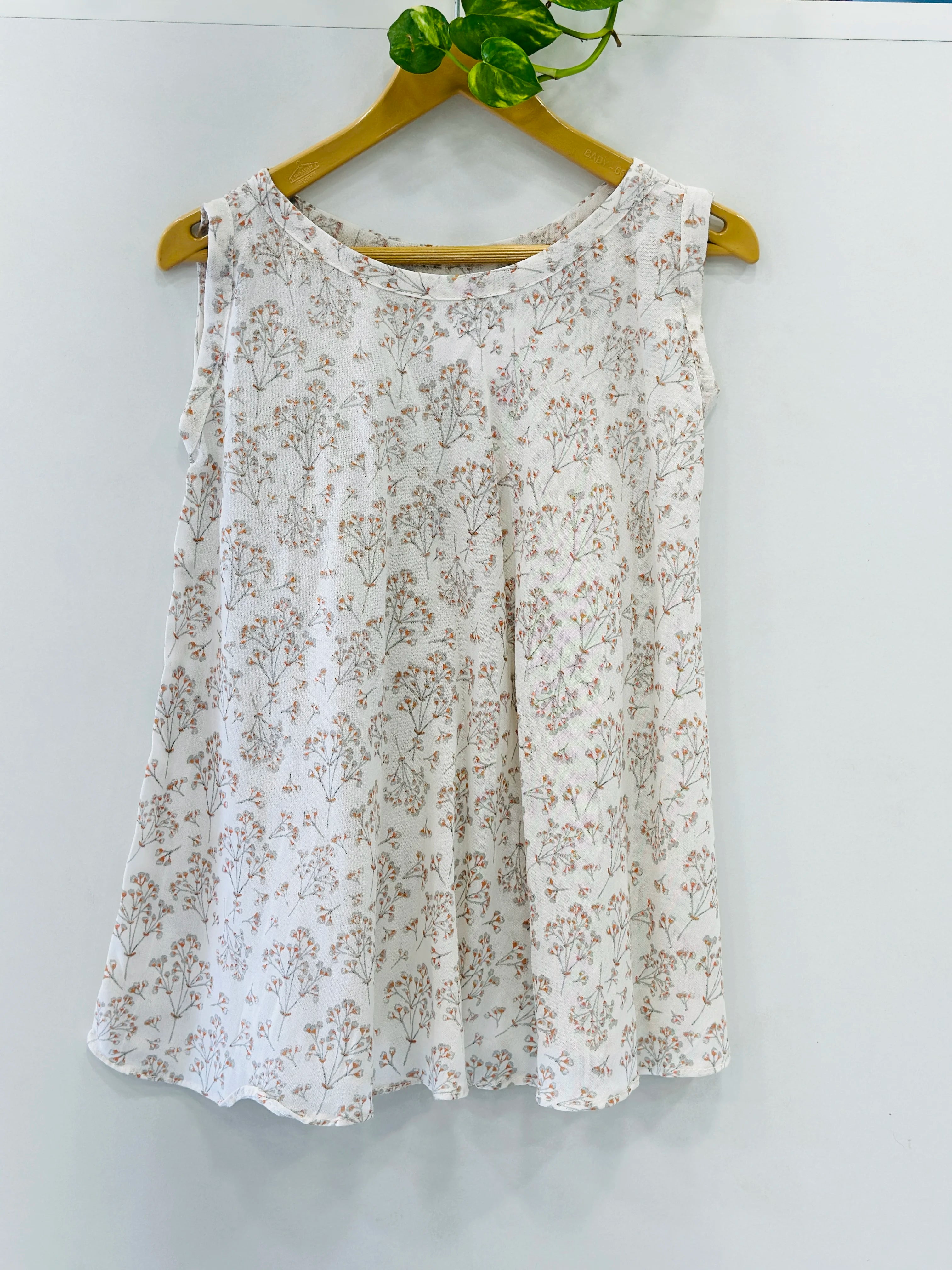 white-cotton-frock-for-baby-girls-casual-wear-with-round-neck-floral-design